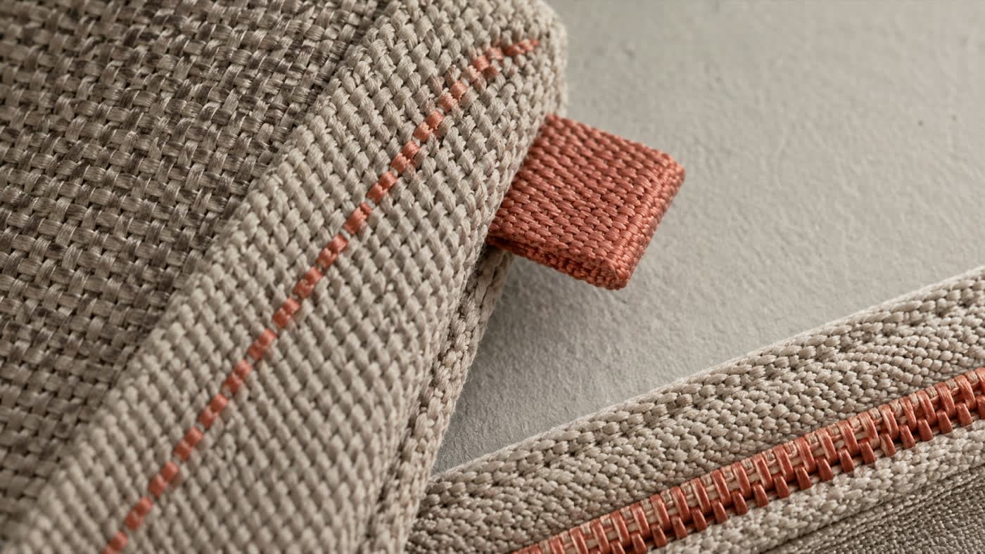 Macro view of the twill weave with a single rose-clay thread